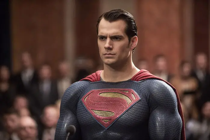 Henry Cavill as Superman in his super suit, looking worried