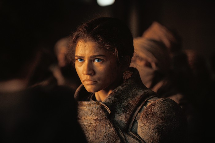 Zendaya as a worried-looking Chani wearing a still in Dune: Part Two.