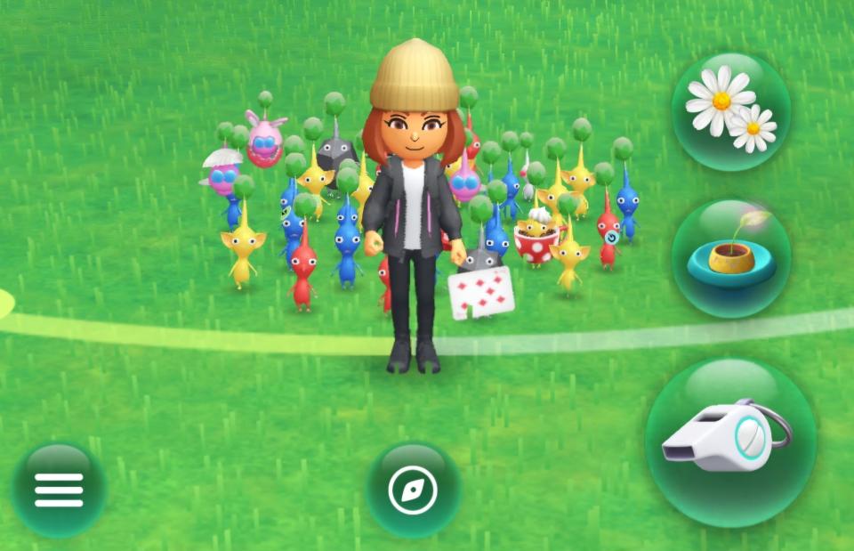 Yazarın Mii'si, Pikmin Bloom'un bir ekran görüntüsünde, çevresinde bir grup Pikmin'in durduğu resimde yer alıyor