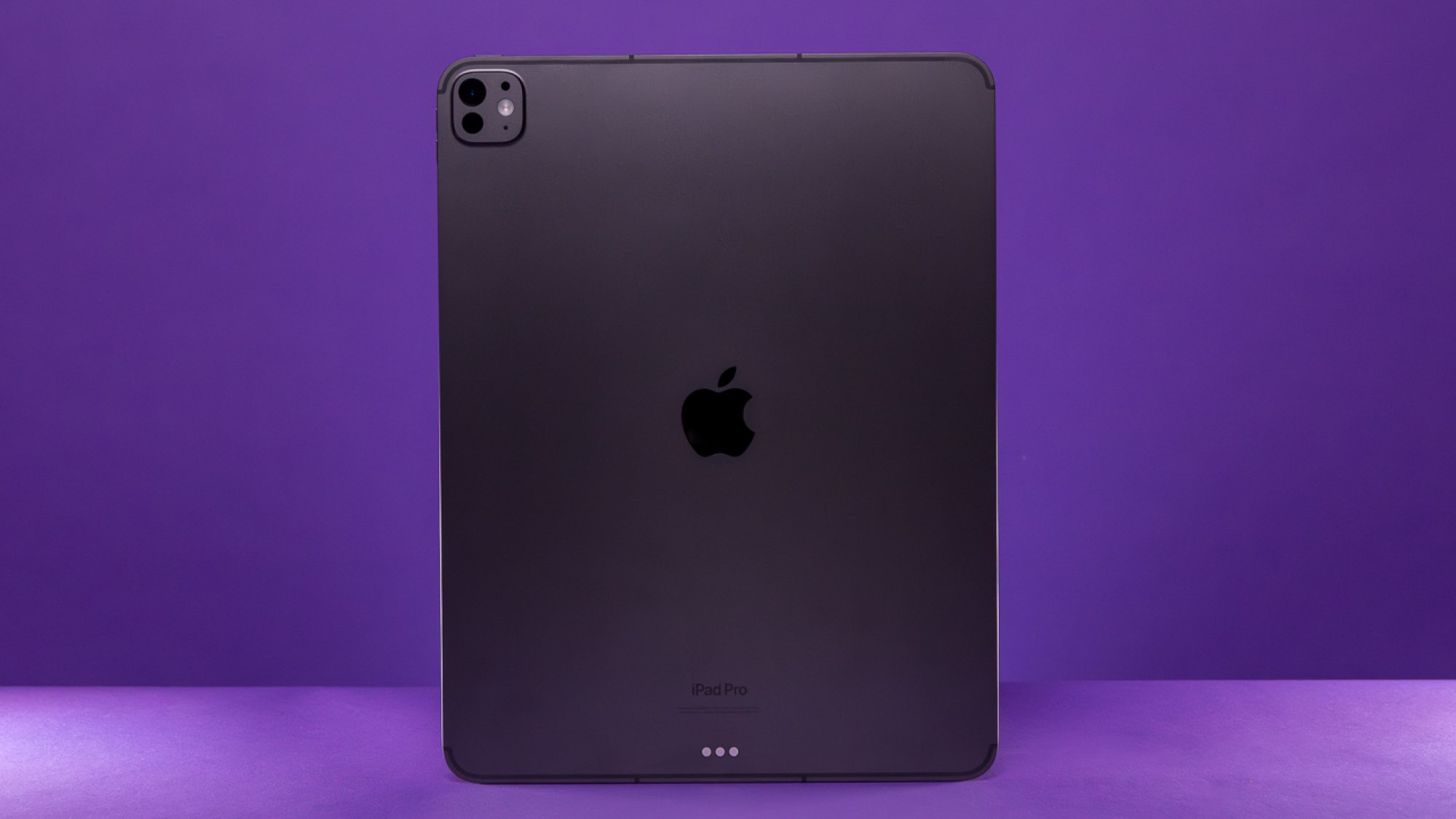 13-inch iPad Pro in front of a purple background